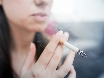A woman smoking cigarette