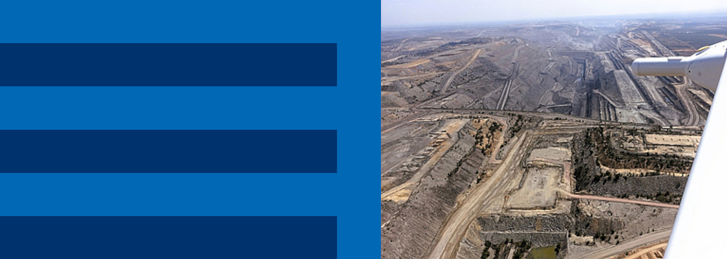 [Translate to English:] Foto eines Kohletagebaus im Bowen Basin, Queensland, Australien, aufgenommen von einem der ARA-Forschungsflugzeuge während eines Messfluges.