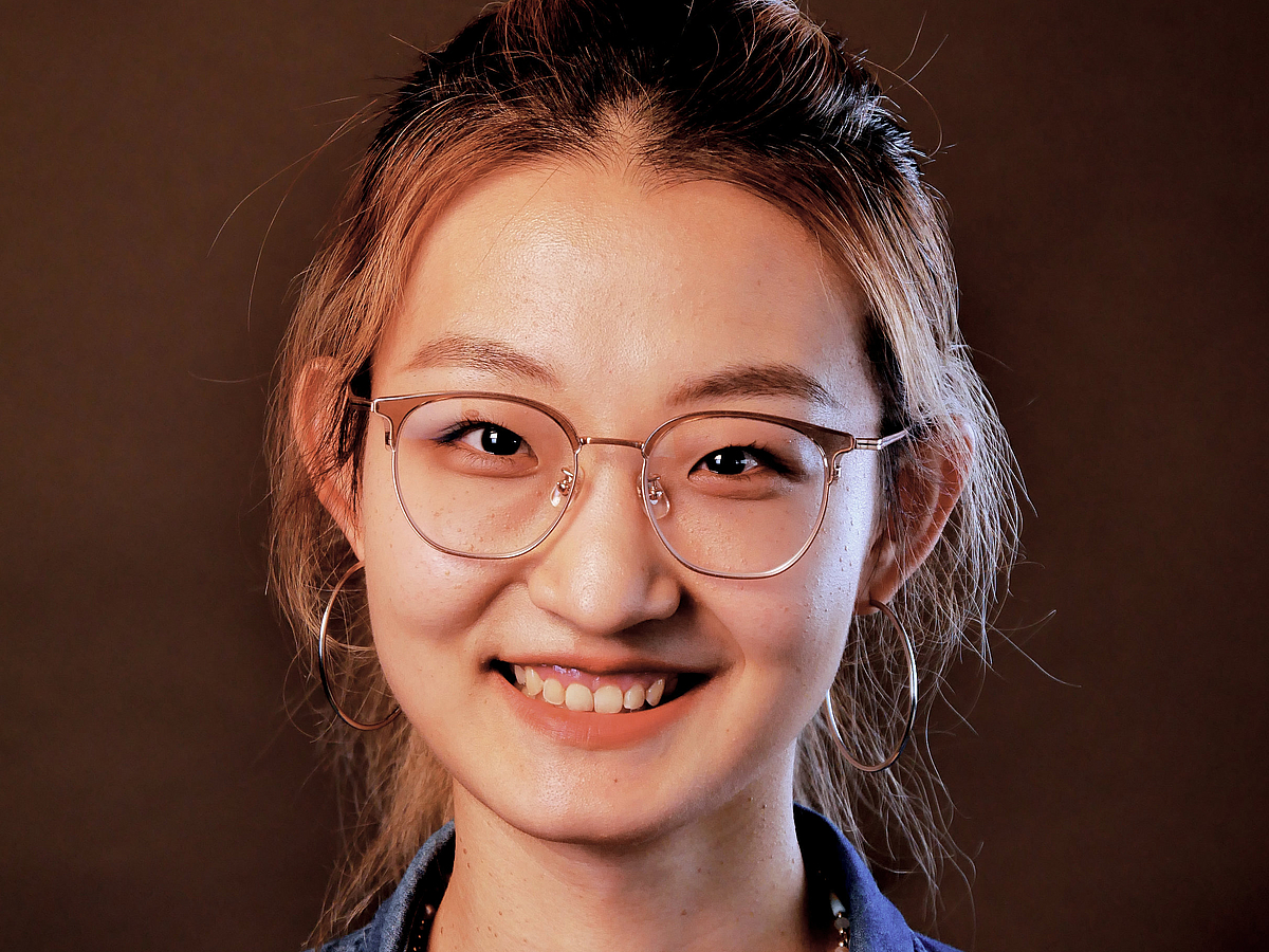 [Translate to English:] Mitarbeiterin Foto von Shiyao Zhang