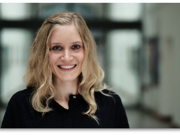 The picture shows a woman with blond hair.