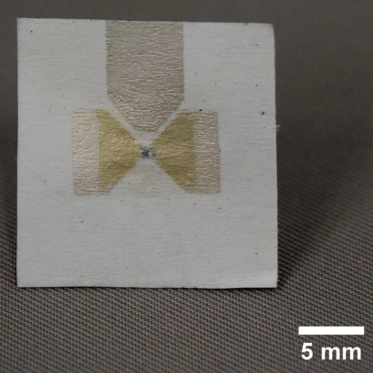 (© SP) Flexible paper OECT with silver source, drain and gate electrode.