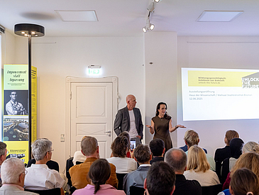 Participants at the exhibition opening