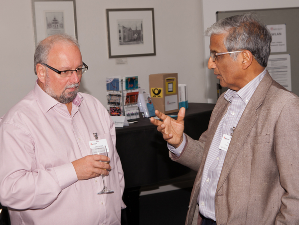 Andreas Rosenauer (University of Bremen), Krishna Rajan (University at Buffalo, USA) discussing