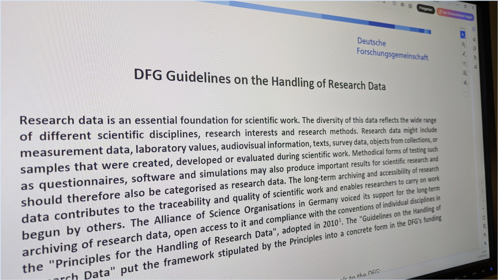 Picture of a Computer Screen with text stating DFG headlines on the Handling of Research Data