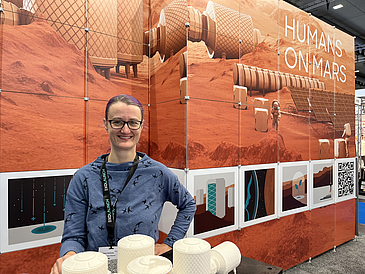 Christiane Heinicke at Space Tech Expo 2022 booth of Humans on Mars