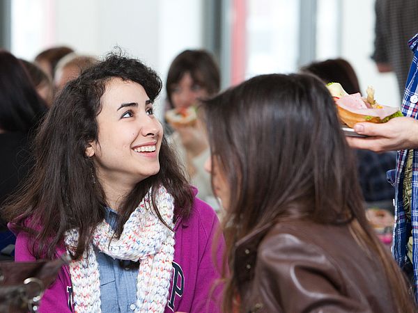 A young women laughs.