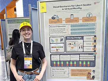 Anika at her poster Anika at her poster