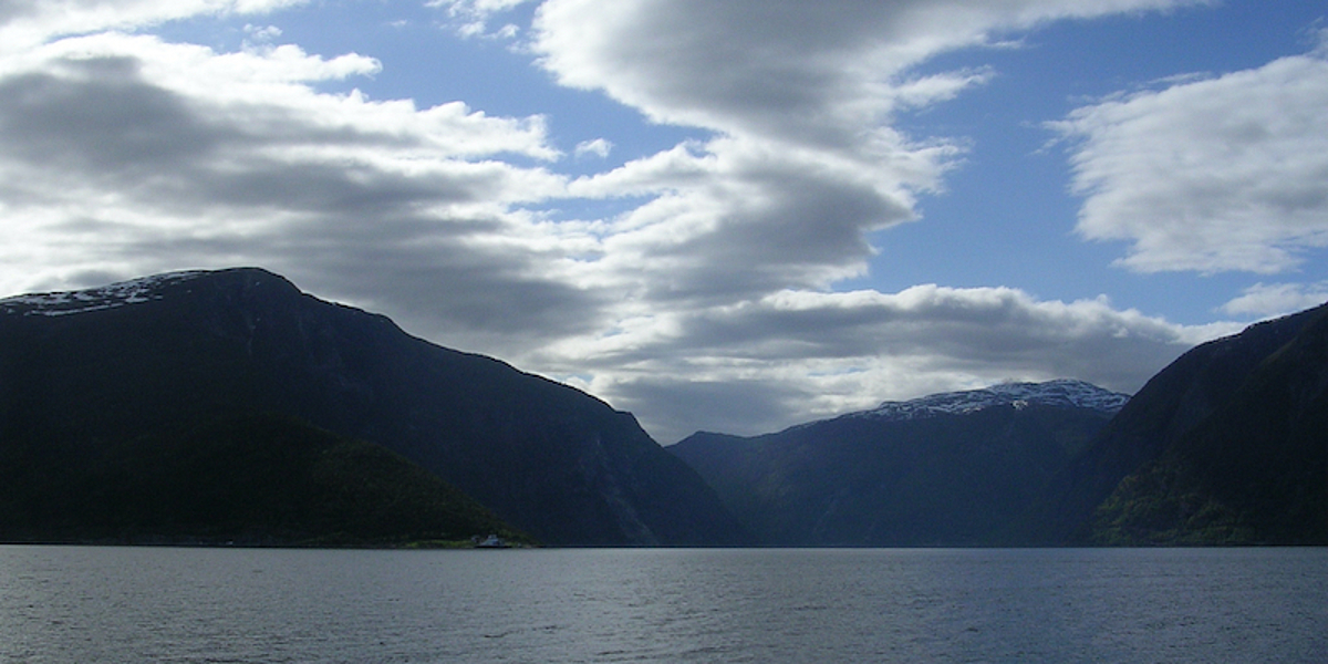 A Norwegian fjord at dusk.