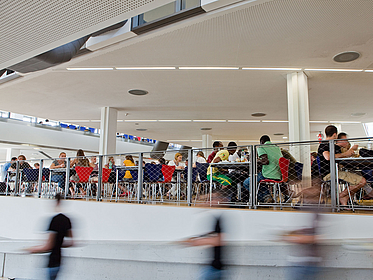 Students eating in the Mensa cafeteria.