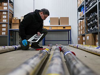 Thomas Felis checking scans and cores.