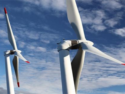 Picture of the Applied Geosciences Master's program, showing the upper part of two wind turbines.