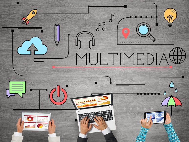 Top view of businesspeople sitting at table and using gadgets